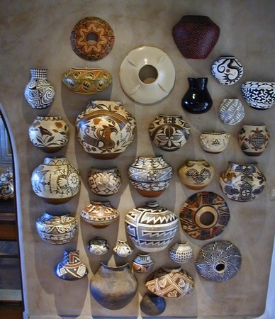 "Half Pots" 32 half pot re-creations of Southwest Native American Indian pottery. 11' x 7'
Mixed media : Installations and Commissions : Fossil and organic mixed media sculpture by Lee Brotherton